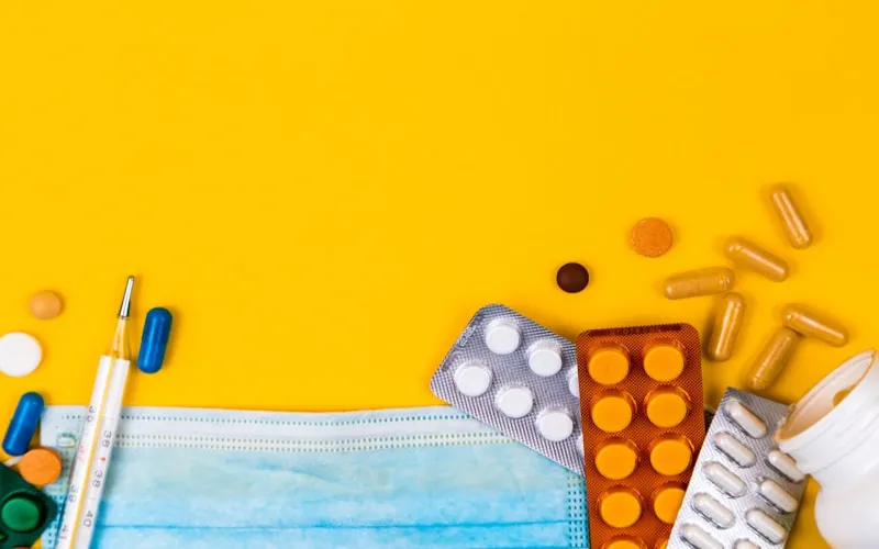 Allergist performing skin prick allergy testing panel on patient's forearm