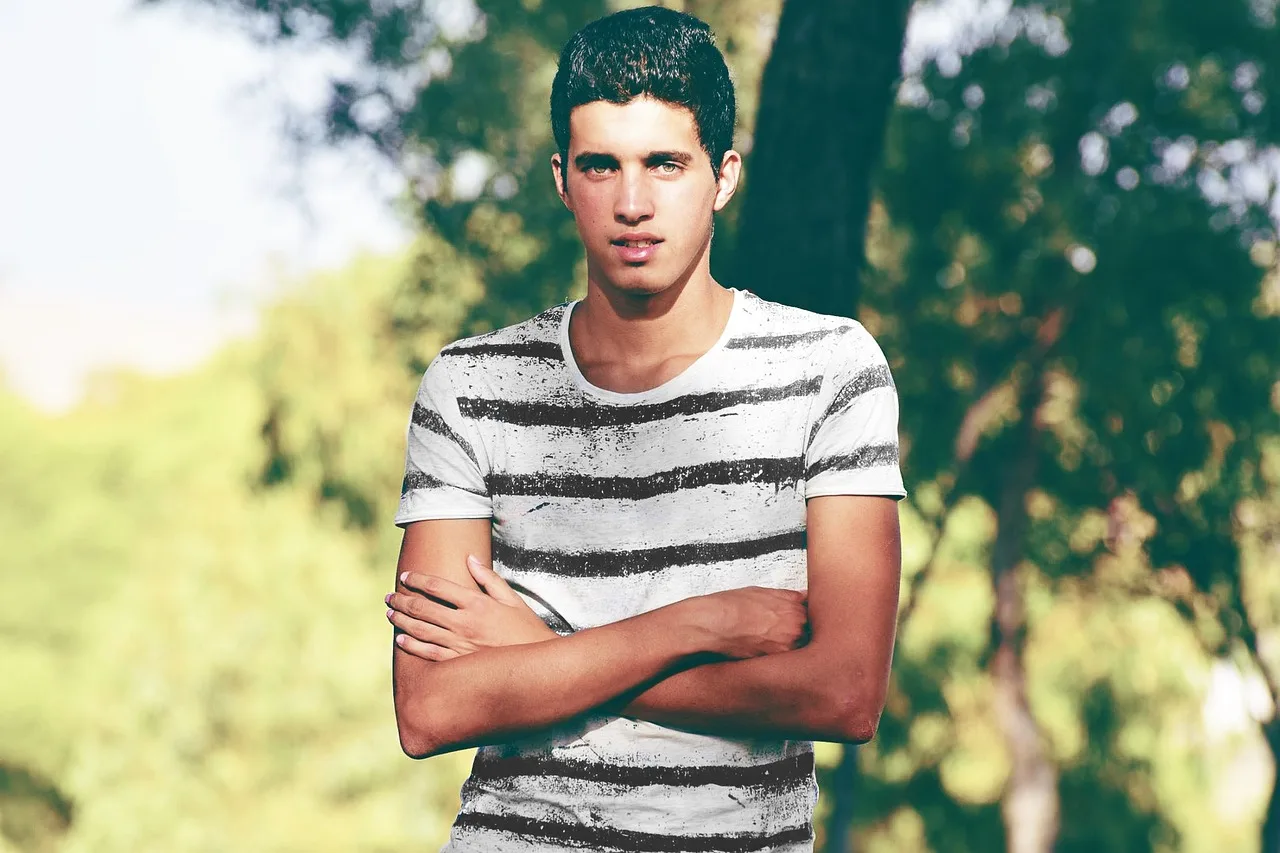 Young patient standing with improved posture after scoliosis correction surgery