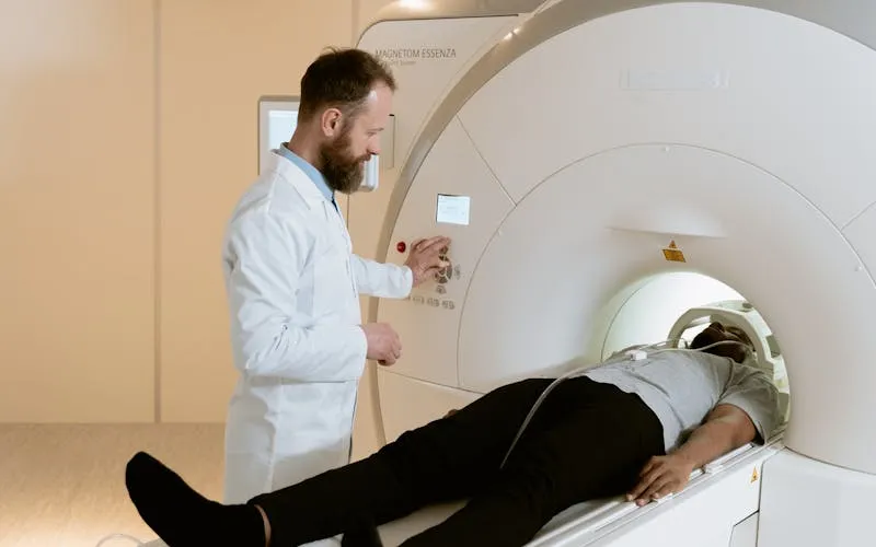 Physiotherapist guiding patient through recovery exercises